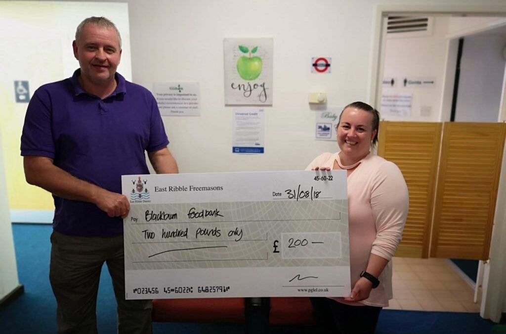 East Ribble District make a donation to Blackburn Foodbank
